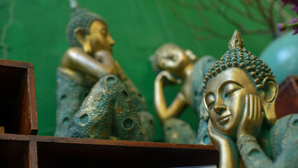 Buddha statue on landscape,
Low angle view of buddha statue on building against sky.
Buddha statue against cloudy sky during sunset.