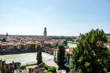 Obraz premium View of Verona city. Colorful residential buildings over Adige river in Verona, Italy