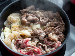 bulgogi, sliced and seasoned, barbequed beef