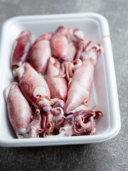 Boiled squid in a disposable container