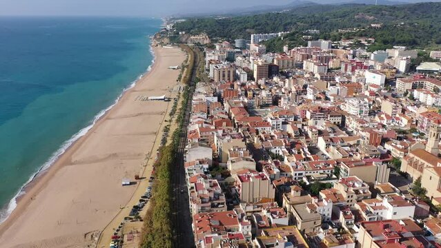 Drone picture over Costa Brava coastal and Mediterranean sea, village Calella, Spain