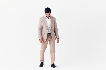 man beige smiling smile business businessman happy suit winner victory running