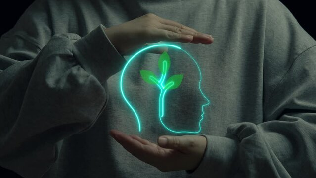 Neon growing tree icon in illustration human head that holding between woman hand in background . Line art and icon concept about ESG, ego friendly or green energy concept.