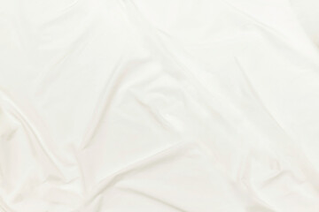 Abstract white fabric texture background Cloth soft wave. Creases of satin, silk, and cotton.