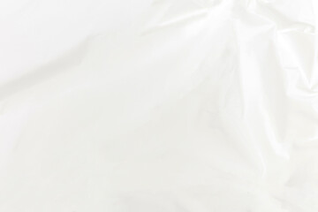 Obraz premium Abstract background Luxury white fabric background with waves, white and gray satin texture. Wrinkled fabric from satin, silk and cotton.