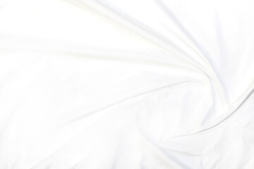 Abstract white fabric texture background. Cloth soft wave. Creases of satin, silk, and cotton.