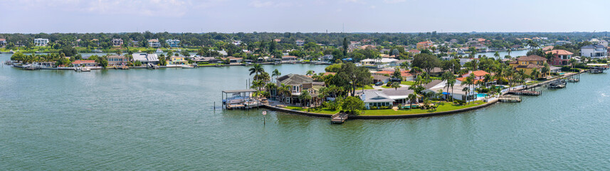 Fototapeta na wymiar Seaside Florida - A panoramic overview of a seaside community on a sunny Summer day. Harbor Bluffs, Florida, USA.