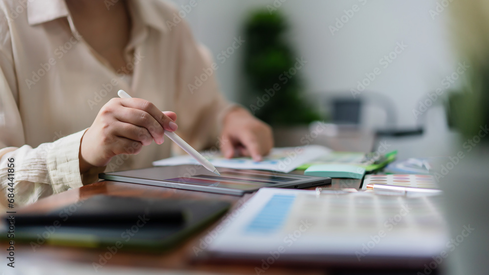 Poster creative graphic designer working about color swatch on tablet and document for designing project
