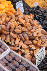  many date fruits display for sale at local market 