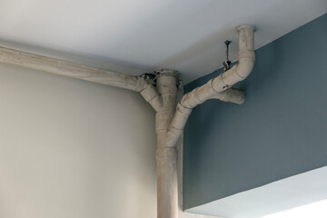under ceiling sewer pipes or drain pipes system in modern building