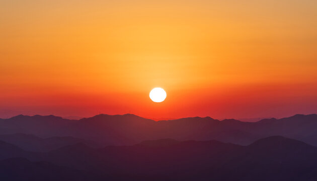A landscape where the sun is setting. sunset, orange glow