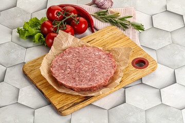 Raw beef uncooked burger cutlet