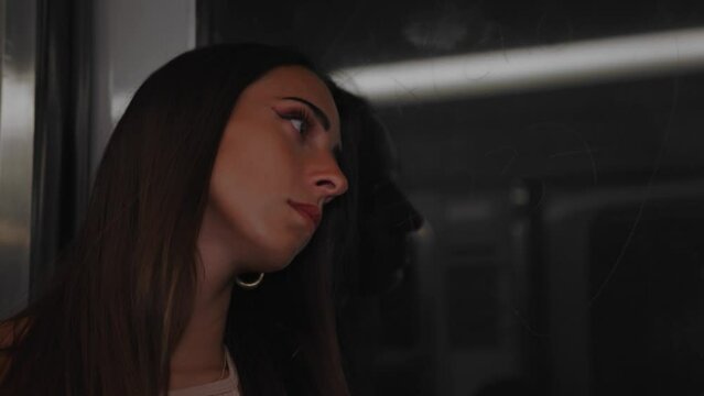 Close-up Of A Woman Riding The Metro Train In The City Of Paris, France.