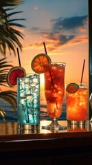 Three vibrant tropical cocktails on a table with a sunset backdrop. Generative AI.