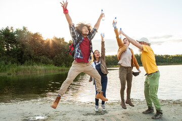Capturing the essence of unbridled joy, this image features a group of friends in mid-celebration...