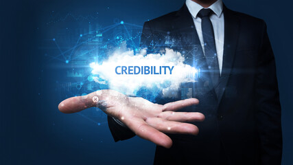 Hand of Businessman holding motivational message