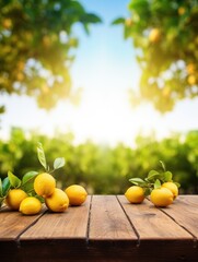 Wooden table top on blurred background orchard with lemons