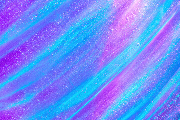 Beautiful purple, mint blue transparent wave pattern glitter slime gel background texture. Glittery...