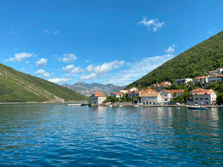 Fototapeta na wymiar Waterfront panorama of historic town Lepetane in Montenegro