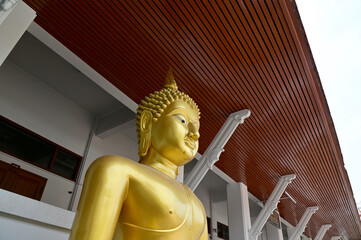 The Golden Buddha Statue located inside the Buddhist temples in Bangkok, Thailand. Concept for...