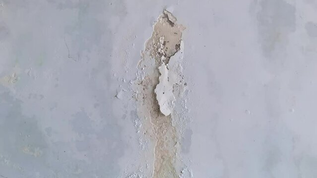 crack and peeled white wall paint