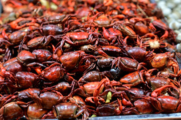 Closeup of Fried Seafood, Fried Small Crabs sold in street food markets at Thailand.