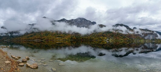 Morning atmosphere at Grundlsee, colourful trees and fog over the lake, Grundlsee, Salzkammergut, Styria, Austria, Europe