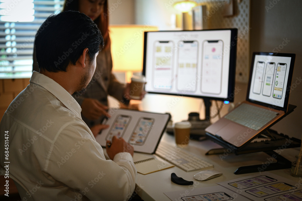 Poster creative designer working on development project for mobile application at home office