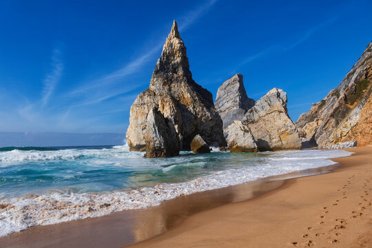 Portugal, Lisbon District, Rock formations at PraiadaUrsa beach