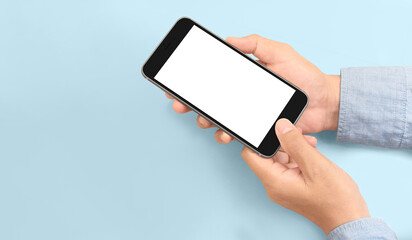 Hand holding smartphone device touching screen