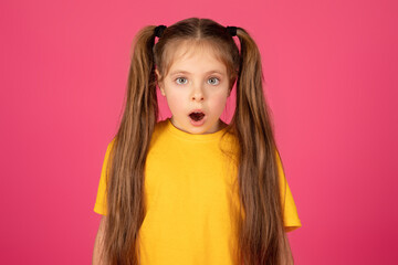 Omg. Portrait Of Shocked Preteen Girl Looking At Camera In Amazement