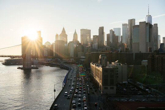 Sunset over skyscrapers near Brooklyn bridge in New York City