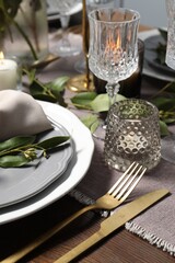 Beautiful table setting with floral decor, closeup