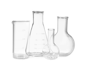 Many laboratory flasks and beaker isolated on white