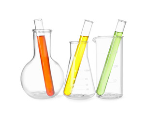Glass flasks, beaker and test tubes with colorful liquids isolated on white