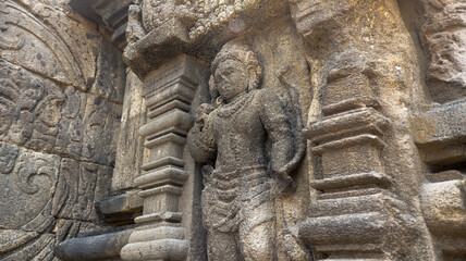 Stone relief on the wall of Prambanan Temple. A Hindu temple located in Yogyakarta, Indonesia