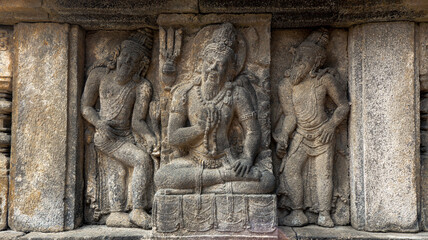 Stone relief on the wall of Prambanan Temple. A Hindu temple located in Yogyakarta, Indonesia