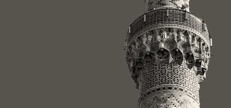The minaret of Green Mosque (Yesil camii) decorated with iznik tiles. Isolated, monochrome, solid color background, banner. Iznik (Nicaea), Bursa region, Turkey