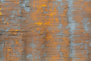 Surface of the wall, old stucco rough surface. Gold and gray. Background or texture for design
