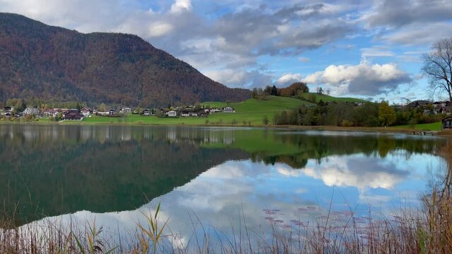 Mirror reflection on Thiersee lake and Alps mountains on background in Austria. Beautiful natural landscape