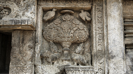 Stone relief on the wall of Prambanan Temple. A Hindu temple located in Yogyakarta, Indonesia