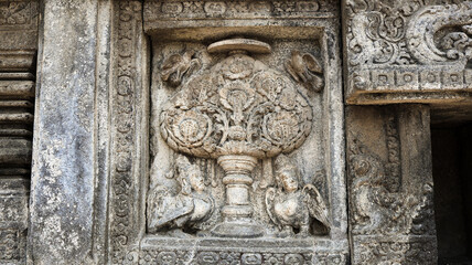 Stone relief on the wall of Prambanan Temple. A Hindu temple located in Yogyakarta, Indonesia