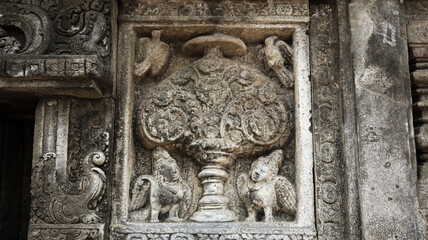 Stone relief on the wall of Prambanan Temple. A Hindu temple located in Yogyakarta, Indonesia