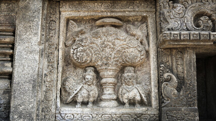Stone relief on the wall of Prambanan Temple. A Hindu temple located in Yogyakarta, Indonesia
