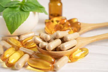 Alternative medicine herbal organic capsule with vitamin E omega 3 fish oil, mineral, drug with...