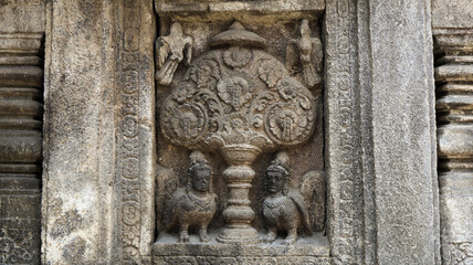 Stone relief on the wall of Prambanan Temple. A Hindu temple located in Yogyakarta, Indonesia