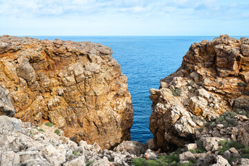 Rocky coast of Punta Nati in Menorca island, Spain