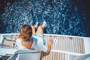 Pretty girl having fun on the yacht - 684535894