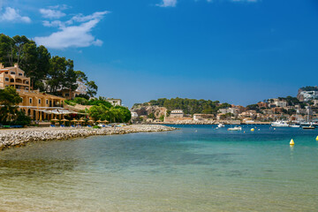Fototapeta na wymiar Picturesque view of a beachfront in Port de Soller in Mallorca