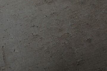 Grey stone surface as background, closeup view